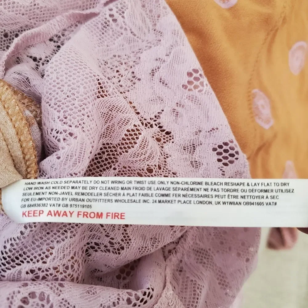 Free People On Board Bodysuit size Small in Orange/Pink